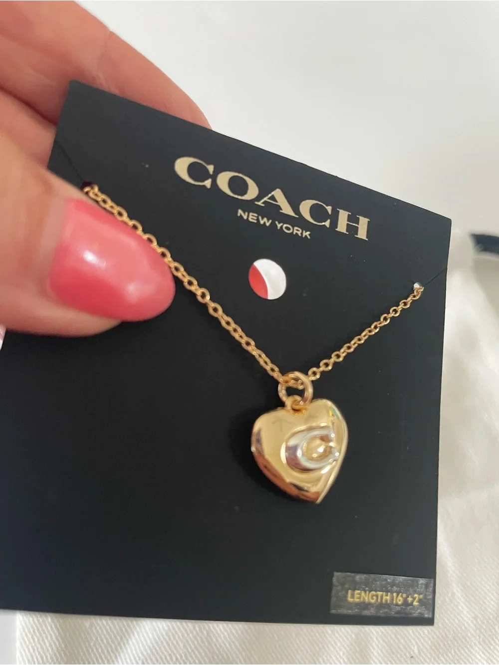 Coach elegant gold